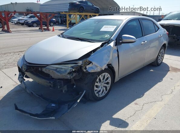 5YFBURHE2JP810951 2018 TOYOTA COROLLA Silver Front left