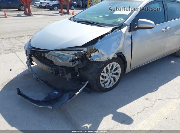 5YFBURHE2JP810951 2018 TOYOTA COROLLA Silver Front view