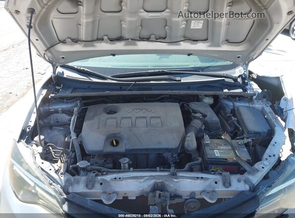 5YFBURHE2JP810951 2018 TOYOTA COROLLA Silver Rear view