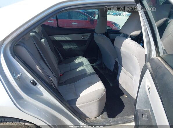5YFBURHE2JP810951 2018 TOYOTA COROLLA Silver VIN sticker view