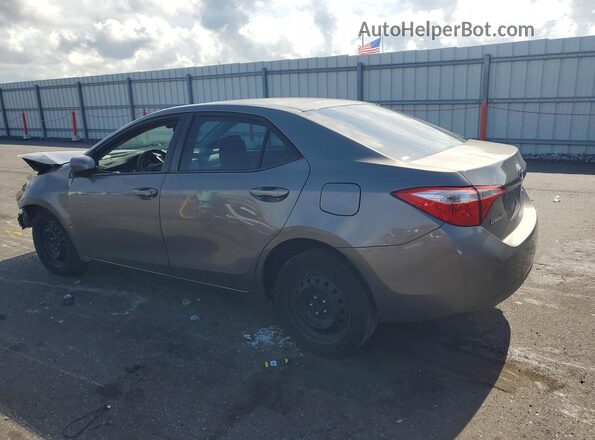 5YFBURHE4HP667740 2017 TOYOTA COROLLA Silver Trasero izquierdo