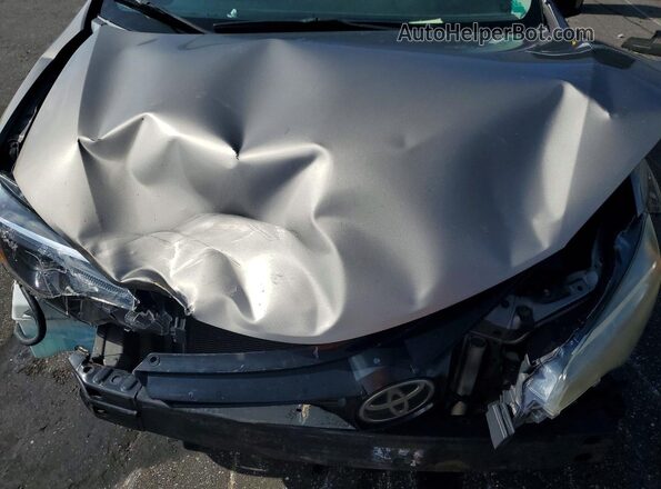 5YFBURHE4HP667740 2017 TOYOTA COROLLA Silver Vista interior trasera