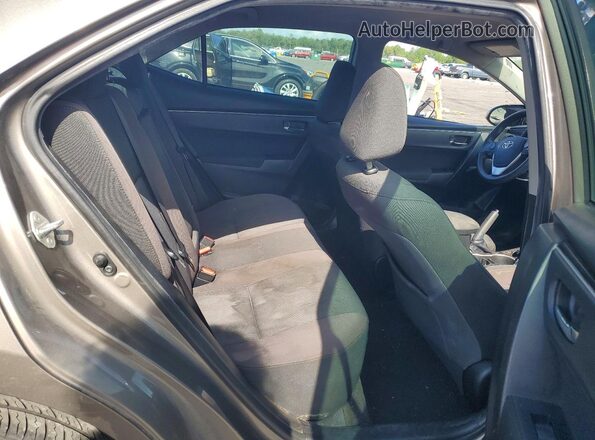 5YFBURHE4HP667740 2017 TOYOTA COROLLA Silver Vista de los asientos traseros