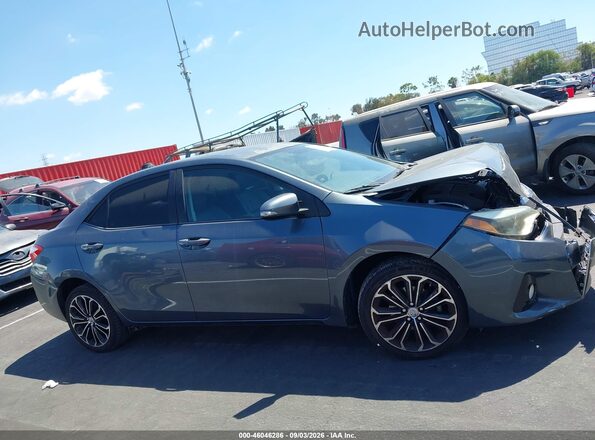 5YFBURHE6GP377434 2016 TOYOTA COROLLA Light Blue Vista interior trasera