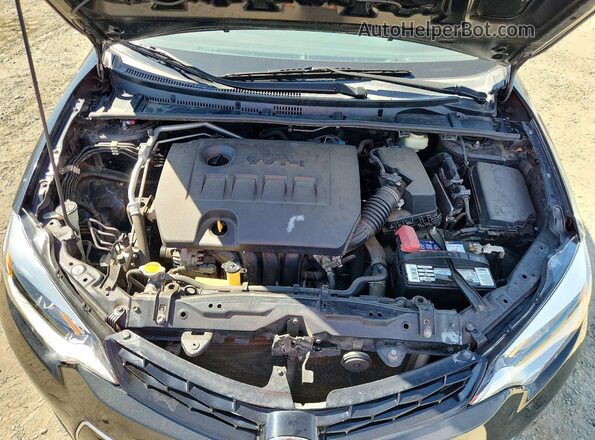5YFBURHE7GP472911 2016 TOYOTA COROLLA Черный Вид задней части салона
