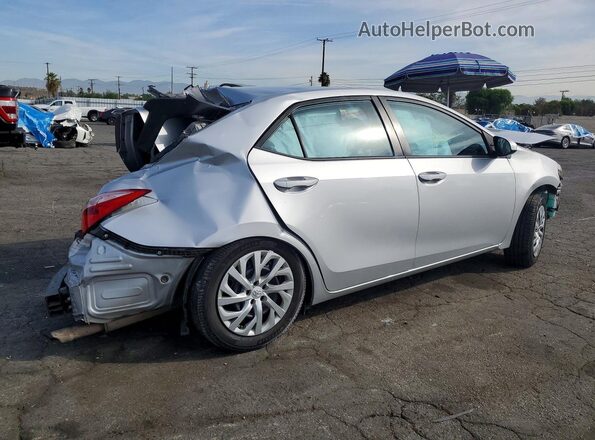 5YFBURHE9HP679771 2017 TOYOTA COROLLA Серебряный Задняя правая четверть