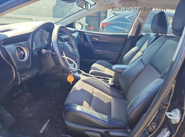 5YFBURHEXJP803438 2018 TOYOTA COROLLA Синий Вид салона спереди
