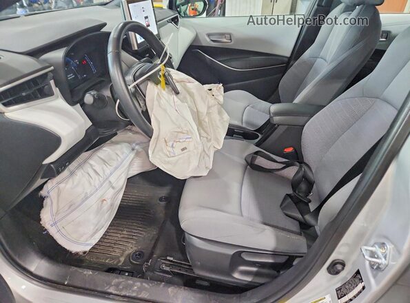5YFP4MCE6SP217658 2025 TOYOTA COROLLA Silver Widok wnętrza z przodu