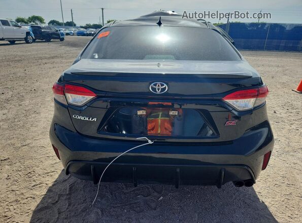 5YFS4MCE4PP157137 2023 TOYOTA COROLLA Black Rear view
