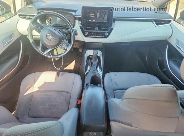 5YFS4MCE8PP145606 2023 TOYOTA COROLLA Серый Вид панели приборов