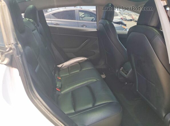 5YJ3E1EA3MF017856 2021 TESLA MODEL White Rear seats view
