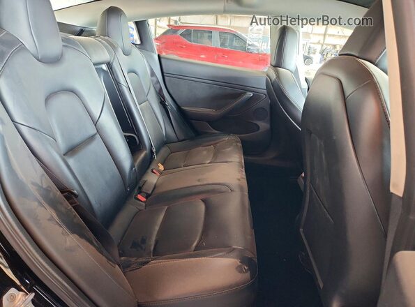 5YJ3E1EB0NF267047 2022 TESLA MODEL Black Widok tylnych siedzeń