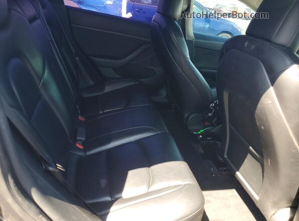 5YJ3E1EB1MF055272 2021 TESLA MODEL Charcoal Widok tylnych siedzeń