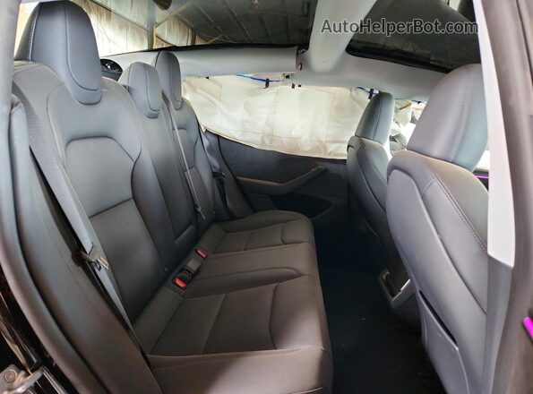 5YJ3E1EB1TF200096 2026 TESLA MODEL Black Vista de los asientos traseros