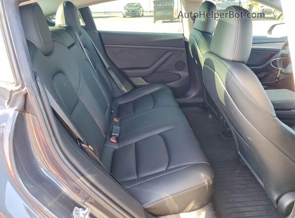 5YJ3E1EB2PF628779 2023 TESLA MODEL Gray Հետևի նստատեղերի տեսք