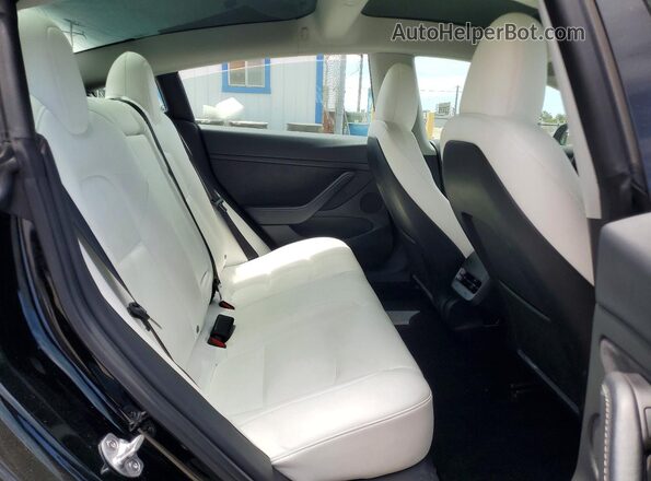 5YJ3E1EB5PF706584 2023 TESLA MODEL Black უკანა სავარძლების ხედი