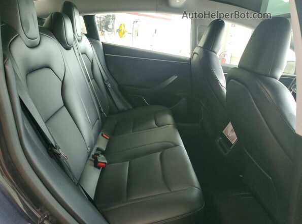 5YJ3E1EB5RF766223 2024 TESLA MODEL Charcoal Widok tylnych siedzeń