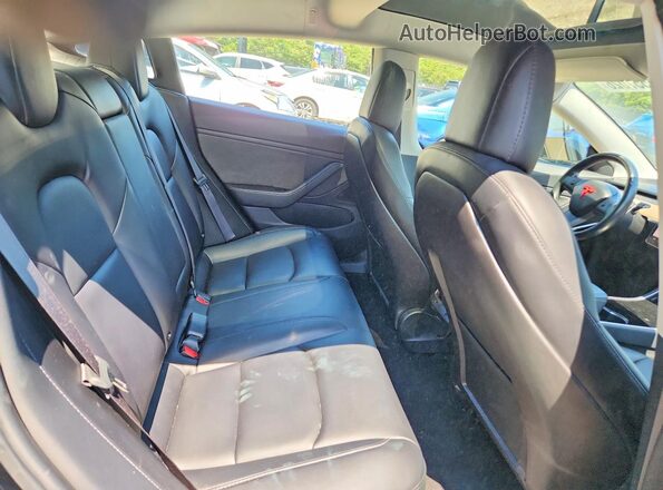 5YJ3E1EB6JF128082 2018 TESLA MODEL Black Widok tylnych siedzeń