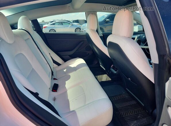 5YJ3E1EB7MF010224 2021 TESLA MODEL White Rear seats view