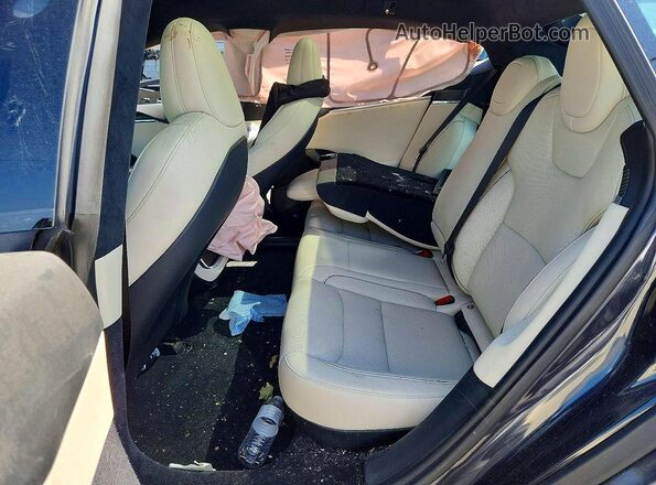 5YJSA1E69PF527362 2023 TESLA MODEL Gray Vista de los asientos traseros