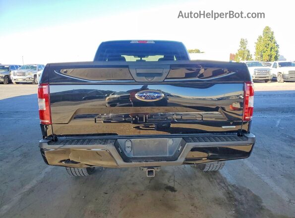 1FTFX1E40KKE50729 2019 FORD F150 Черный Вид салона спереди