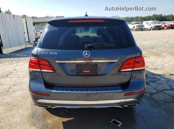 4JGDA5JB9GA668908 2016 MERCEDES-BENZ GLE Gray Front interior view