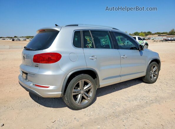 WVGUV7AX4HK018357 2017 VOLKSWAGEN TIGUAN Silver Front right
