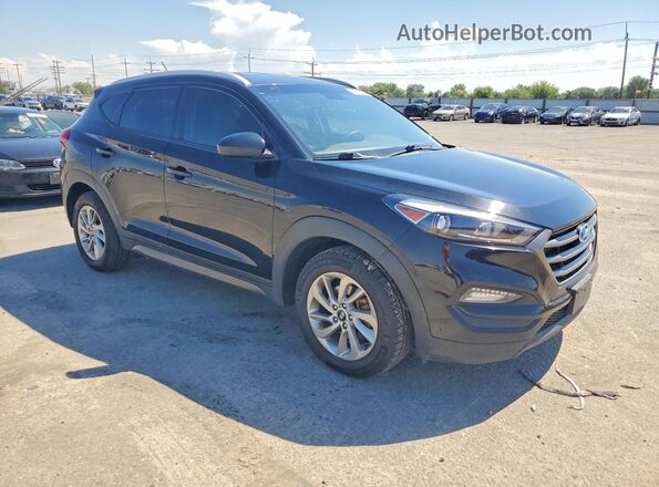 KM8J3CA45GU035632 2016 HYUNDAI TUCSON Black Front view