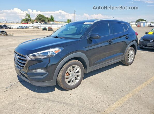 KM8J3CA45GU035632 2016 HYUNDAI TUCSON Black Rear left