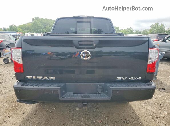 1N6AA1E5XJN546768 2018 NISSAN TITAN Black Front interior view