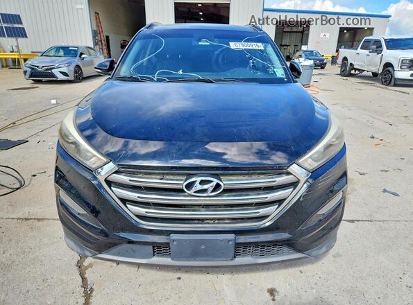 KM8J33A2XGU200296 2016 HYUNDAI TUCSON Black უკანა ხედი