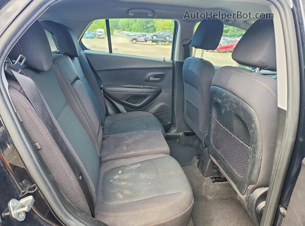 3GNCJNSB3JL330989 2018 CHEVROLET TRAX Black Rear interior view