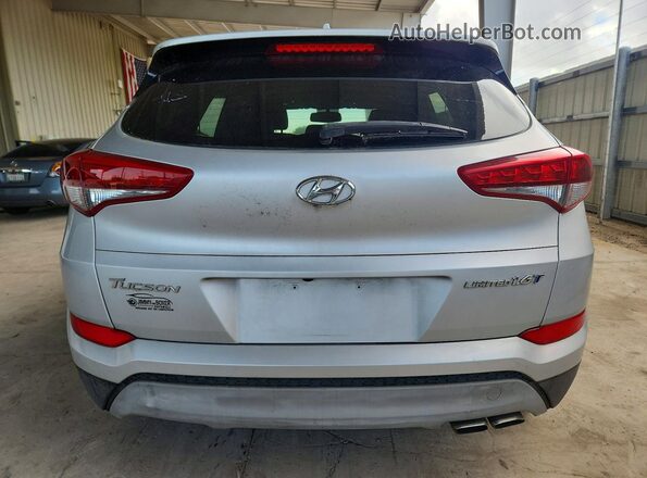 KM8J33A20JU737671 2018 HYUNDAI TUCSON Silver წინა სალონის ხედი