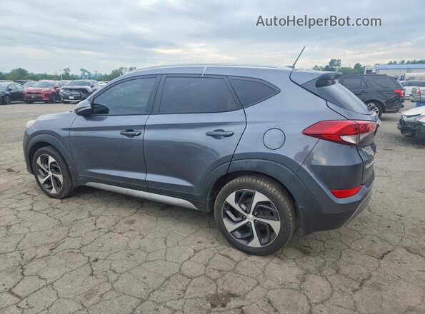 KM8J3CA22HU265032 2017 HYUNDAI TUCSON Gray უკანა მარჯვენა