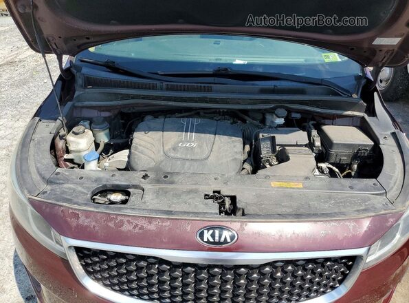 KNDMB5C11G6179217 2016 KIA SEDONA Темно-бордовый Вид наклейки с VIN-кодом