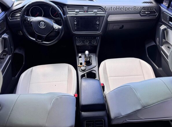 3VV3B7AX6JM085115 2018 VOLKSWAGEN TIGUAN Charcoal Rear seats view