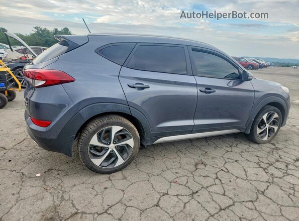 KM8J3CA22HU265032 2017 HYUNDAI TUCSON Gray წინა მარჯვენა