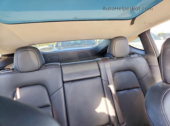7SAYGDEF4NF490568 2022 TESLA MODEL Black Rear interior view