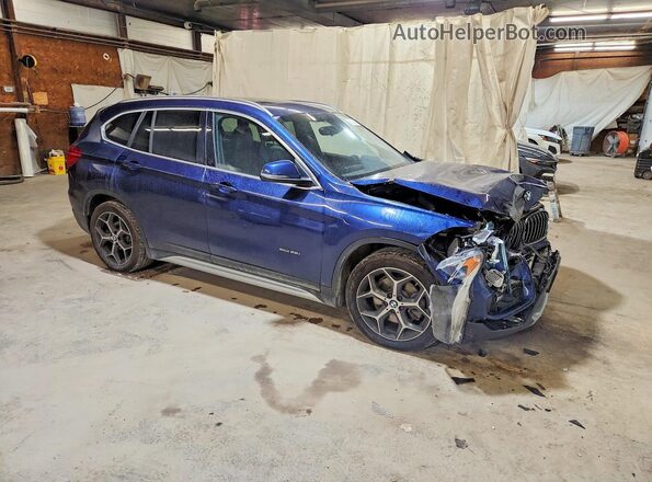 WBXHT3C32GP883105 2016 BMW X1 Blue Вид спереду