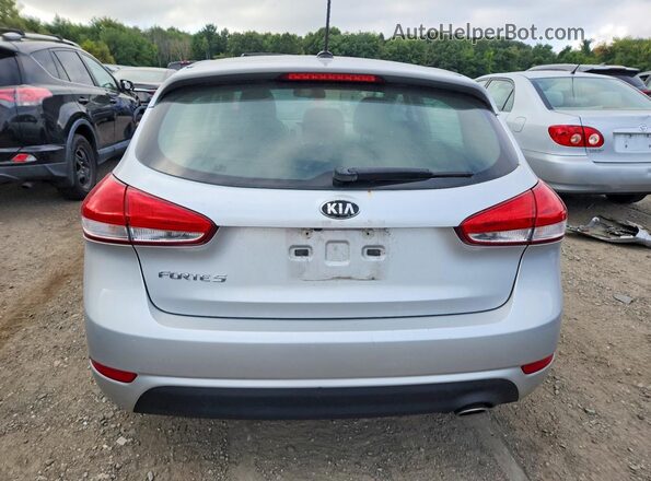 KNAFX5A82G5494847 2016 KIA FORTE Серебряный Вид салона спереди