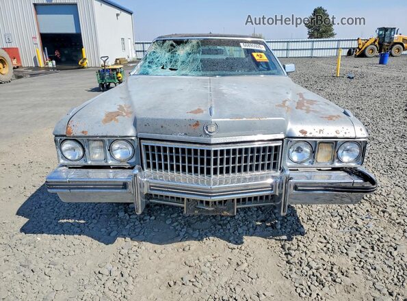 6B69R3Q209708 1973 CADILLAC UK Серебряный Вид спереди