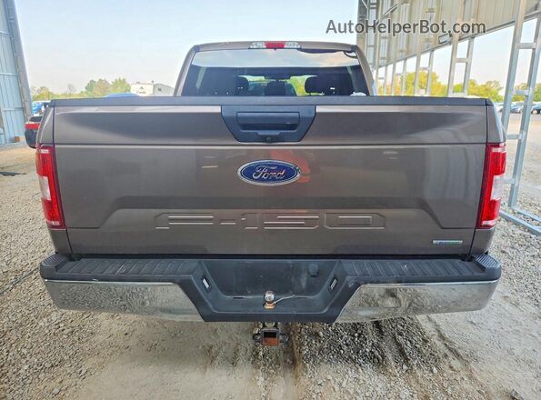1FTEW1E40LFA21728 2020 FORD F150 Brown Widok wnętrza z przodu