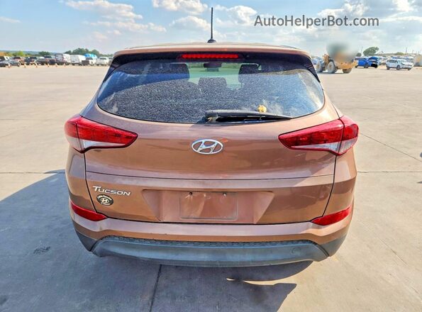 KM8J23A47HU430206 2017 HYUNDAI TUCSON Brown Front interior view