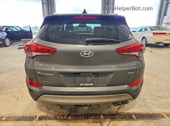 KM8J3CA20JU633259 2018 HYUNDAI TUCSON Gray Vista interior delantera