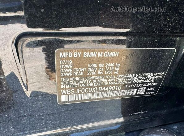 WBSJF0C0XLB449010 2020 BMW M5 Black Вид задньої частини салону