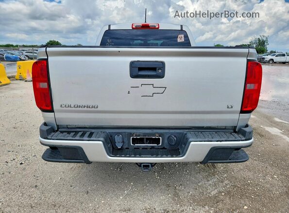 1GCGTBEN8H1211099 2017 CHEVROLET COLORADO Серебряный Вид салона спереди