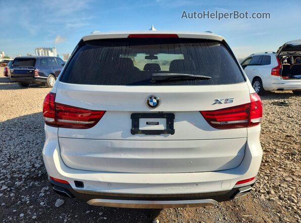 5UXKT0C57J0W02451 2018 BMW X5 White Front interior view