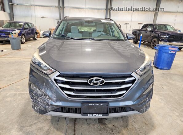 KM8J3CA20JU633259 2018 HYUNDAI TUCSON Gray Vista trasera