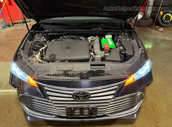 4T1AZ1FB6NU077623 2022 TOYOTA AVALON Black Front interior view