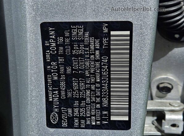KM8J33A43JU654740 2018 HYUNDAI TUCSON Серебряный Вид задней части салона